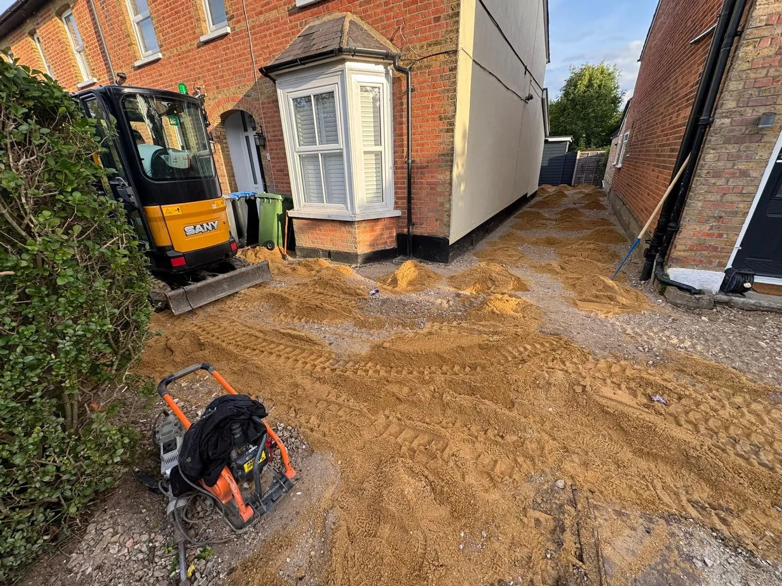 Digging out the side access ready for a new base