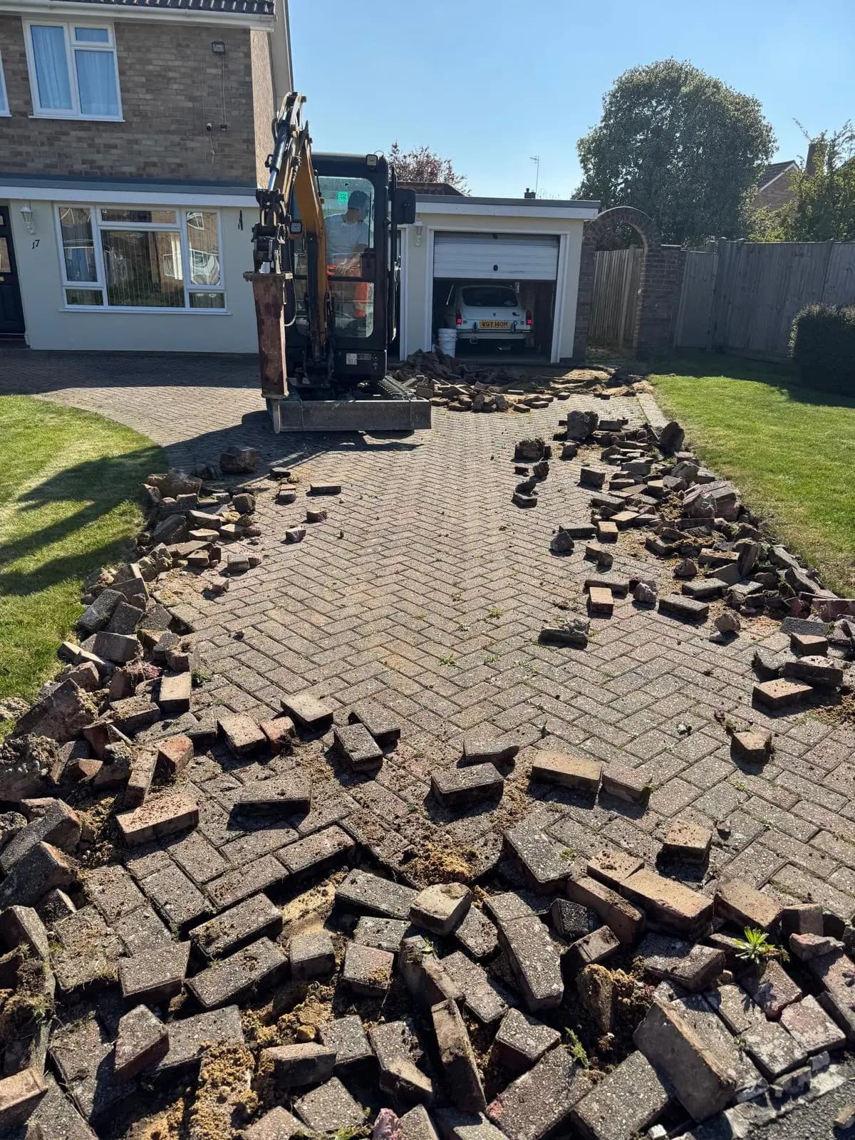 Lifting the old blocks with a mini-digger