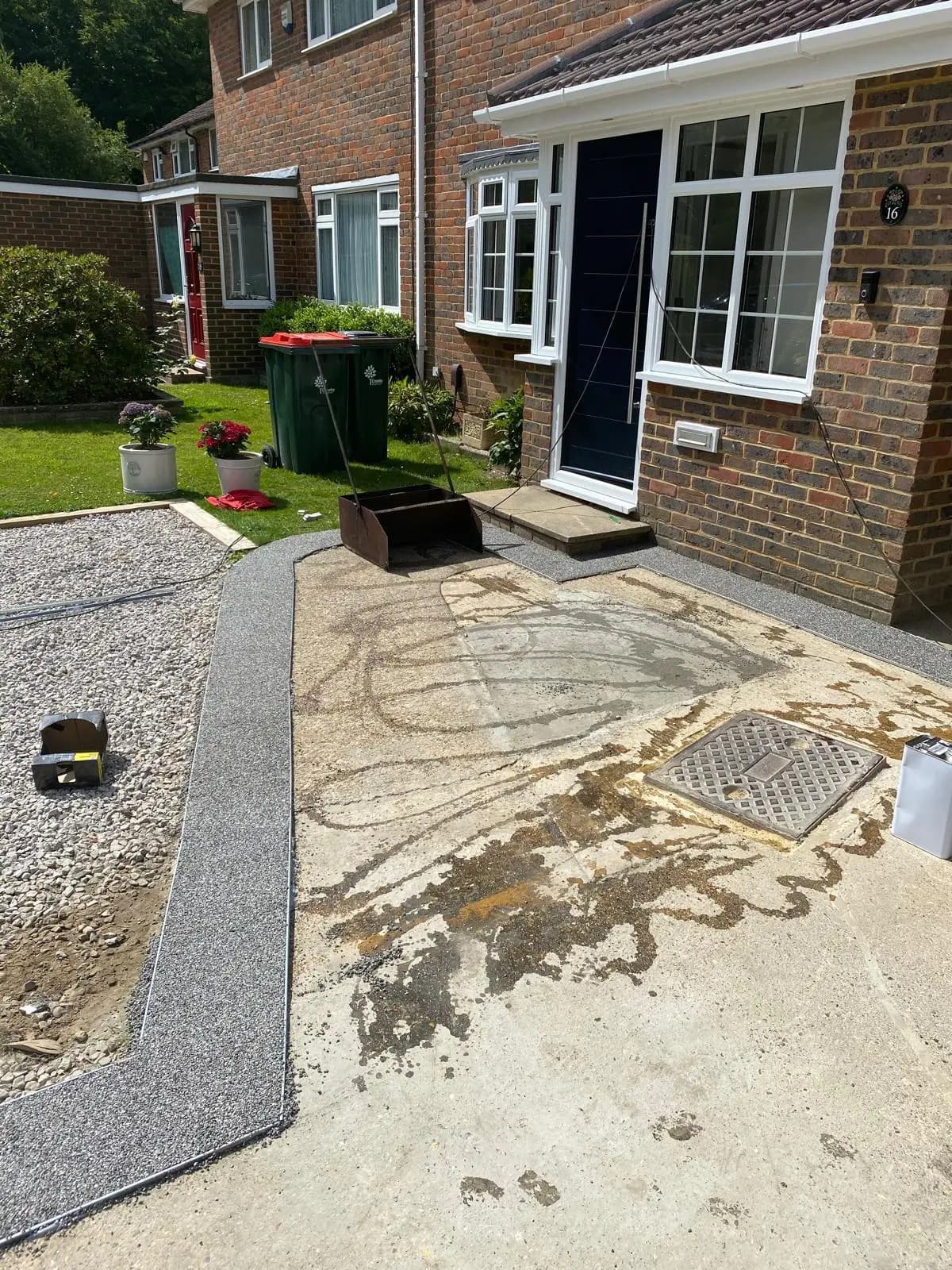 New silver-grey resin-bound surface going in over the prepared base
