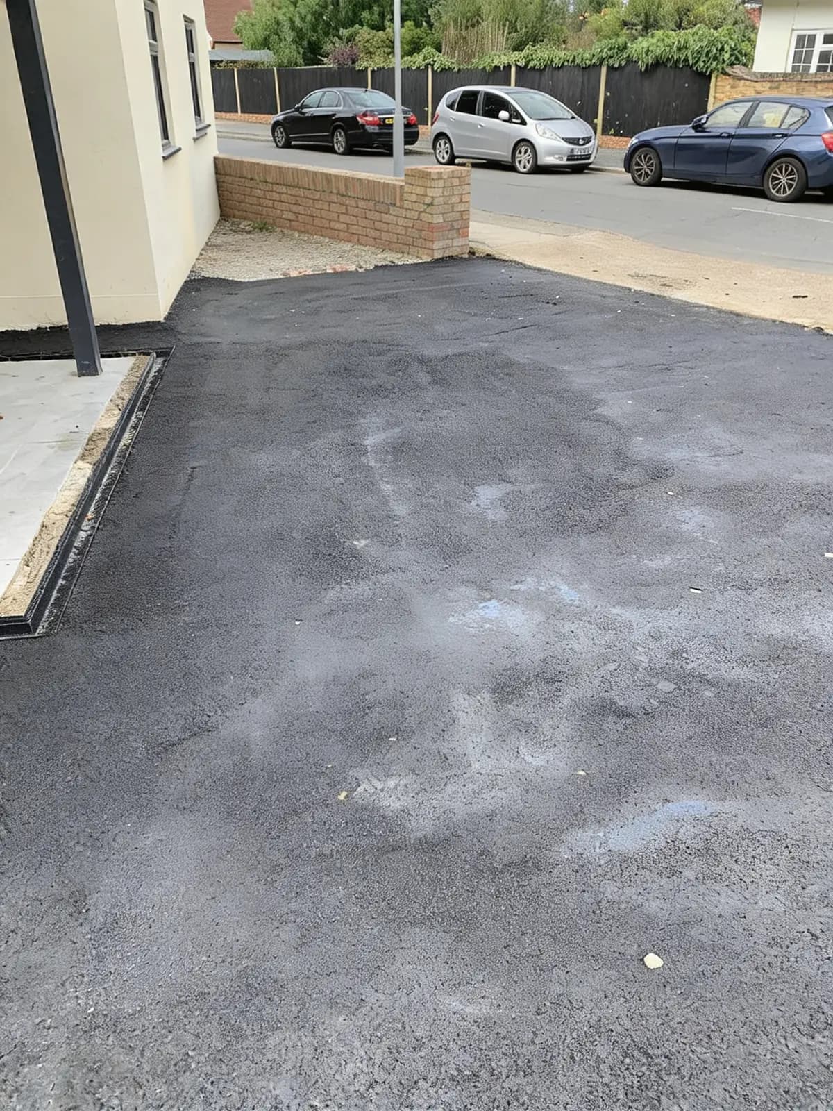 The porous tarmac base complete and ready for the resin-bound surface