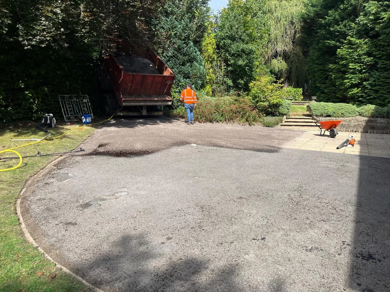 Applying and rolling in the stone chippings
