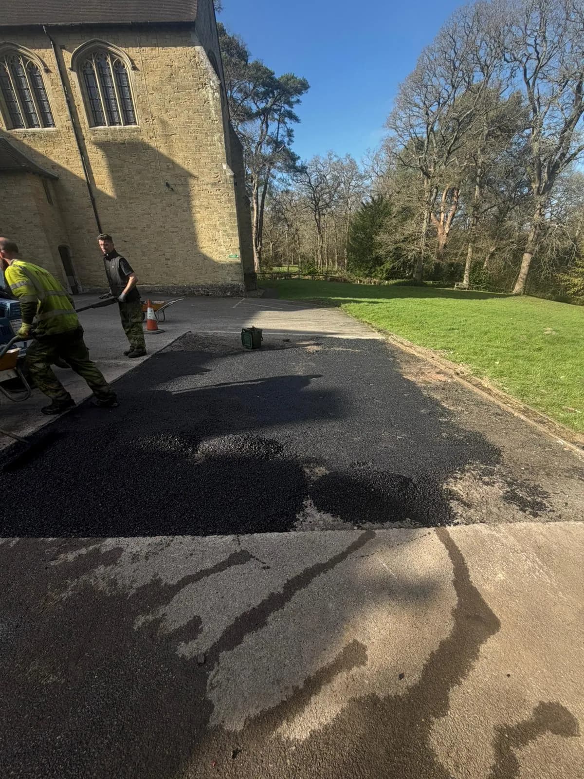 Tarmac area beside the church