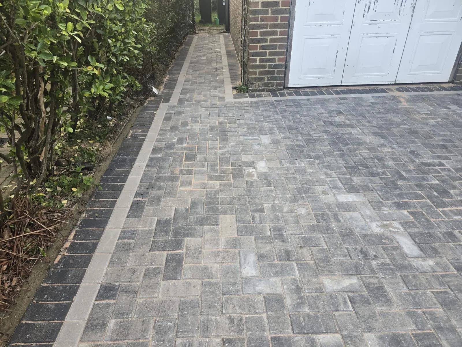Charcoal block paving driveway and side path in Surrey
