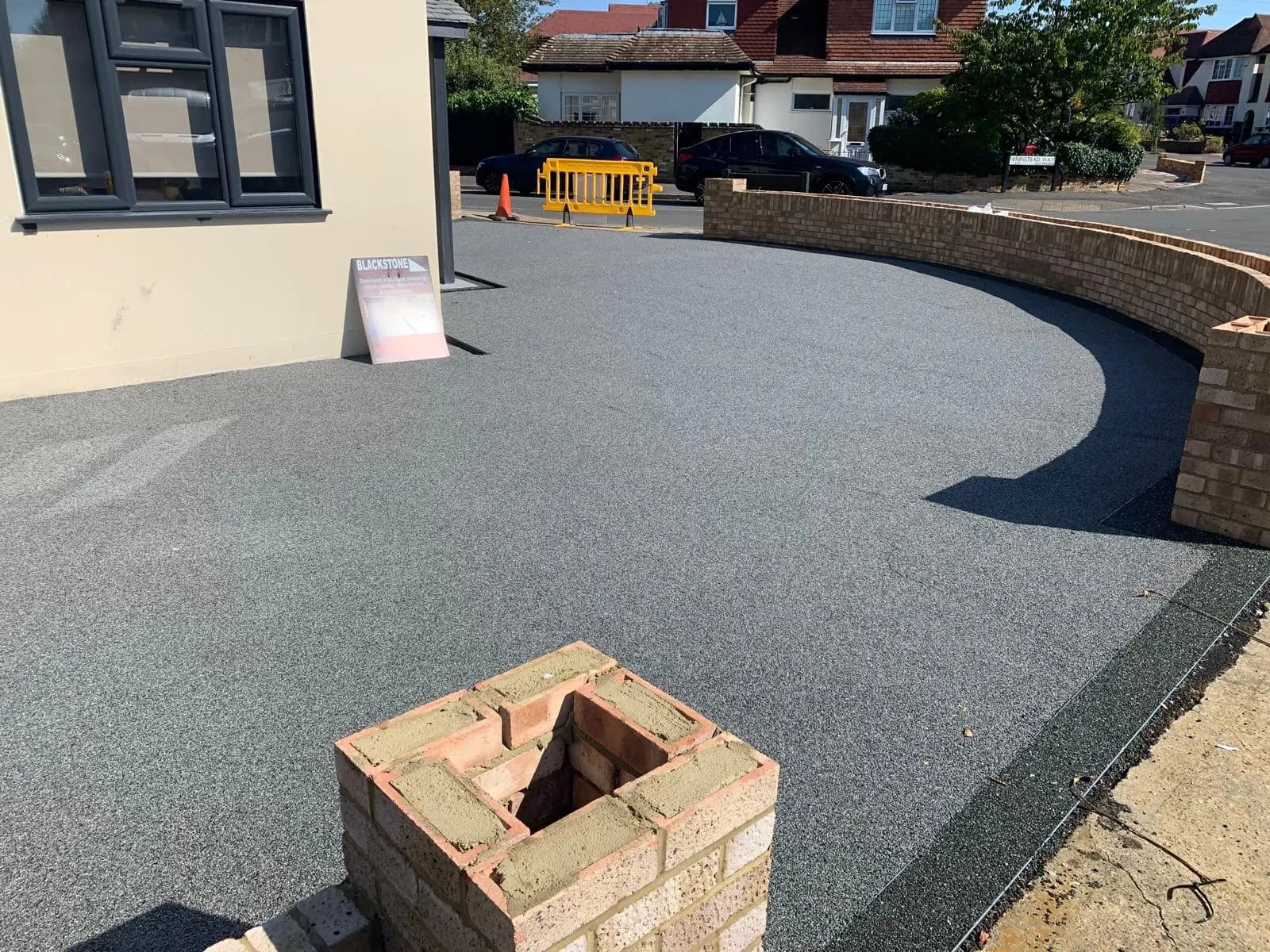 Permeable resin-bound driveway that drains freely