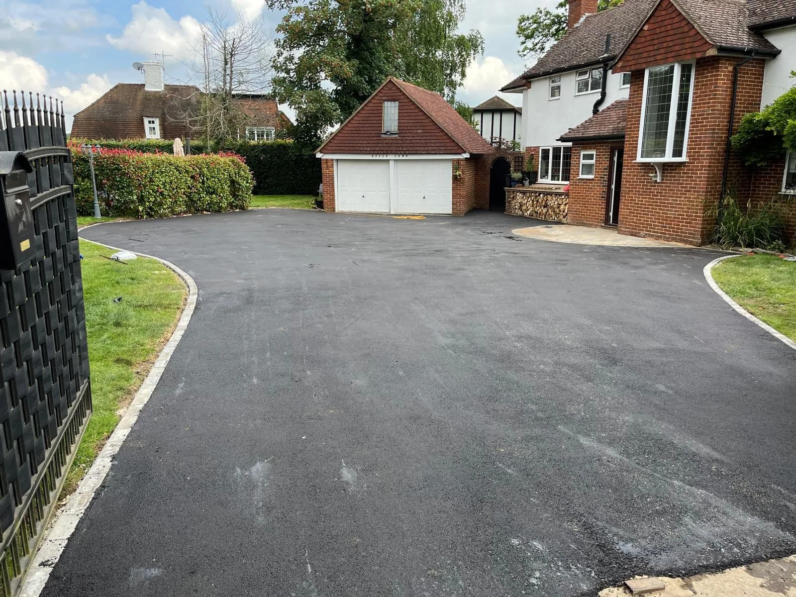 Finished smooth tarmac driveway in Woking